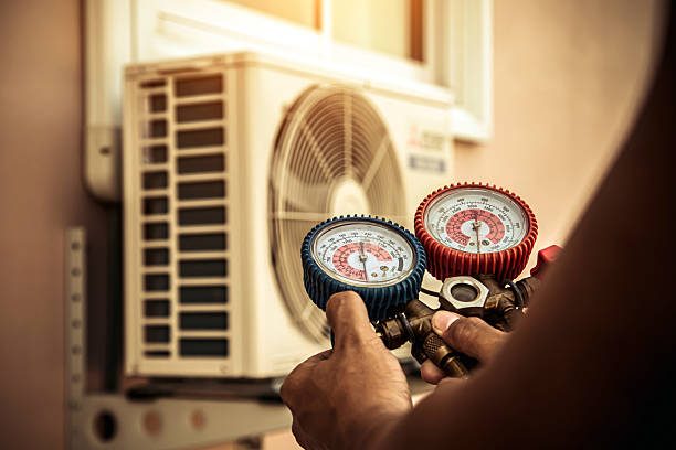 Professional Air Conditioning Service technician working in Haverhill, MA